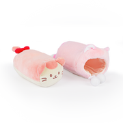 Kittiroll cat plush with a red bow shown outside its removable pink kitty onesie Outfitz
