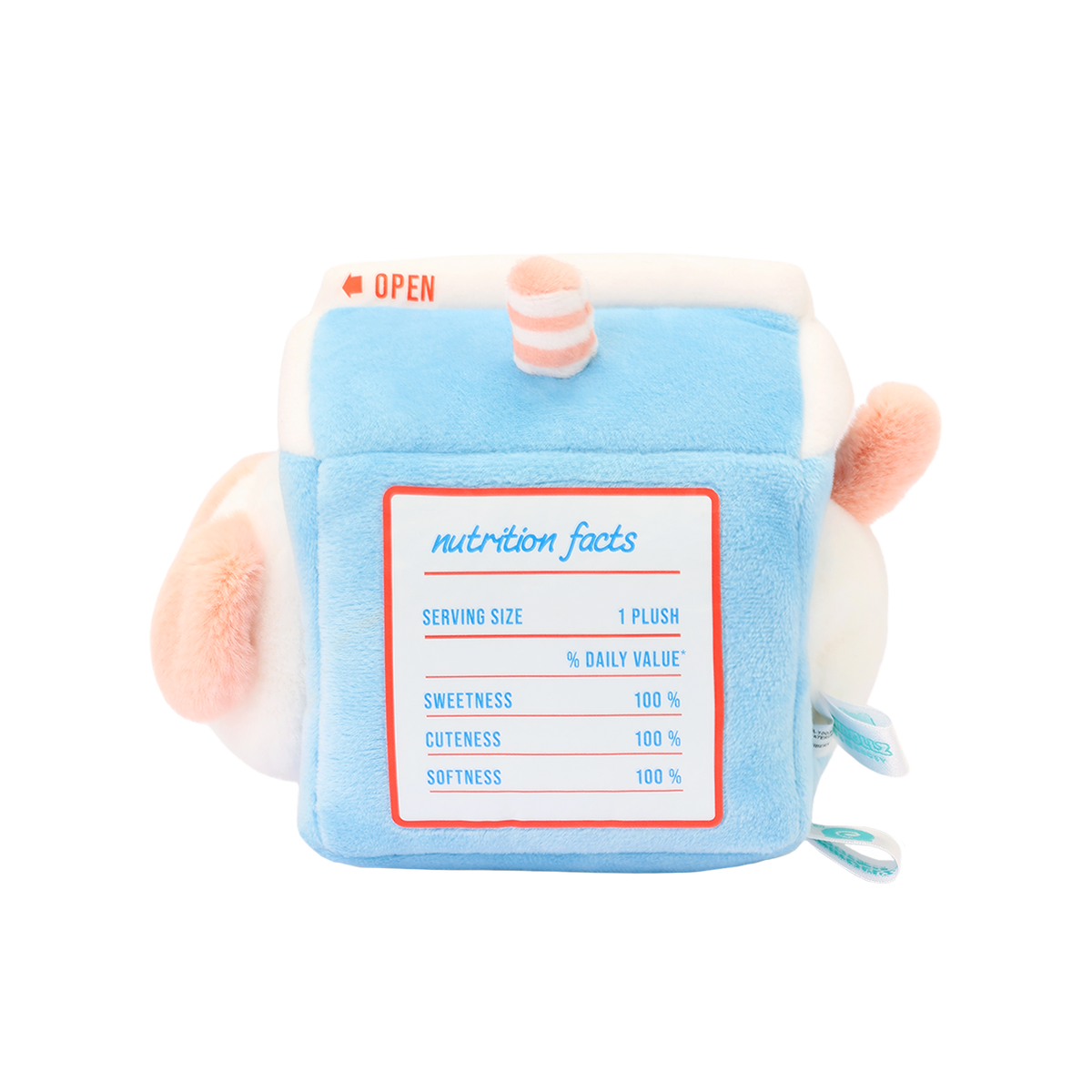 ide of milk carton plush with printed nutrition facts: sweetness, cuteness, and softness 100%