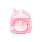 Back of Strawberry Milk Kittiroll plush showing the kitty’s pink tail with a bow through the carton opening
