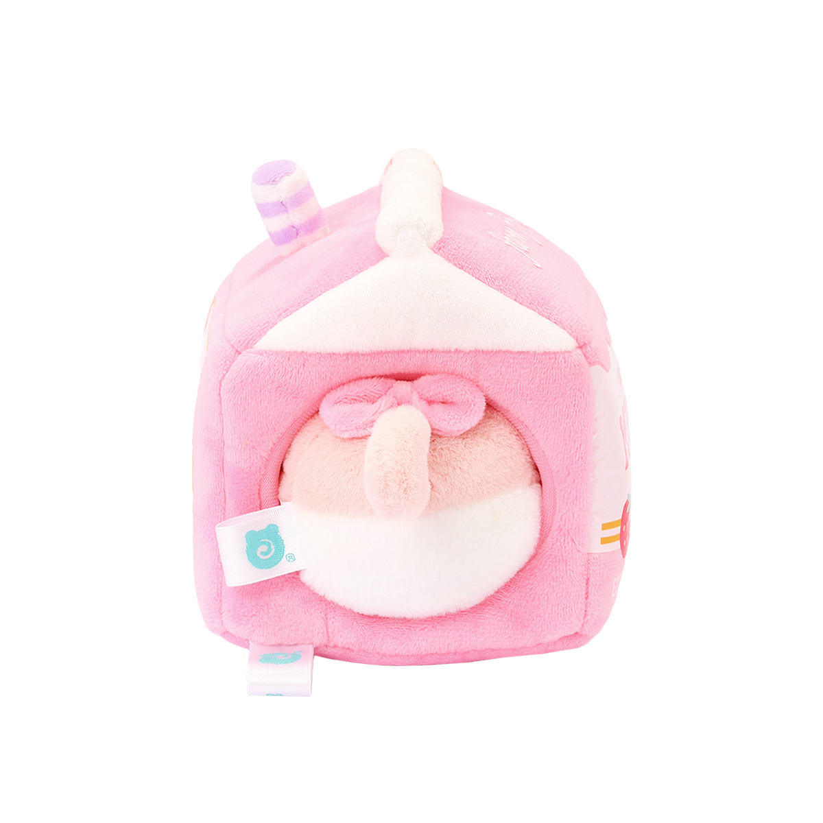 Back of Strawberry Milk Kittiroll plush showing the kitty’s pink tail with a bow through the carton opening